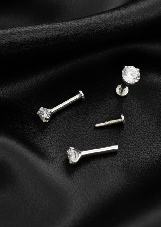 Real silver nose studs with screw back lock.