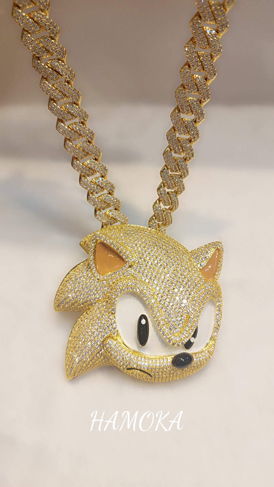 Pendentif sonique plaqué or glacé