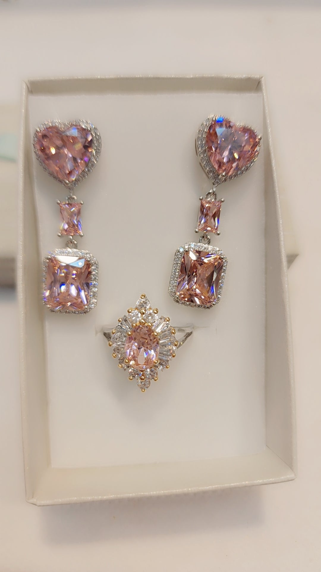 Boucle d'oreille et bague plaquées or blanc