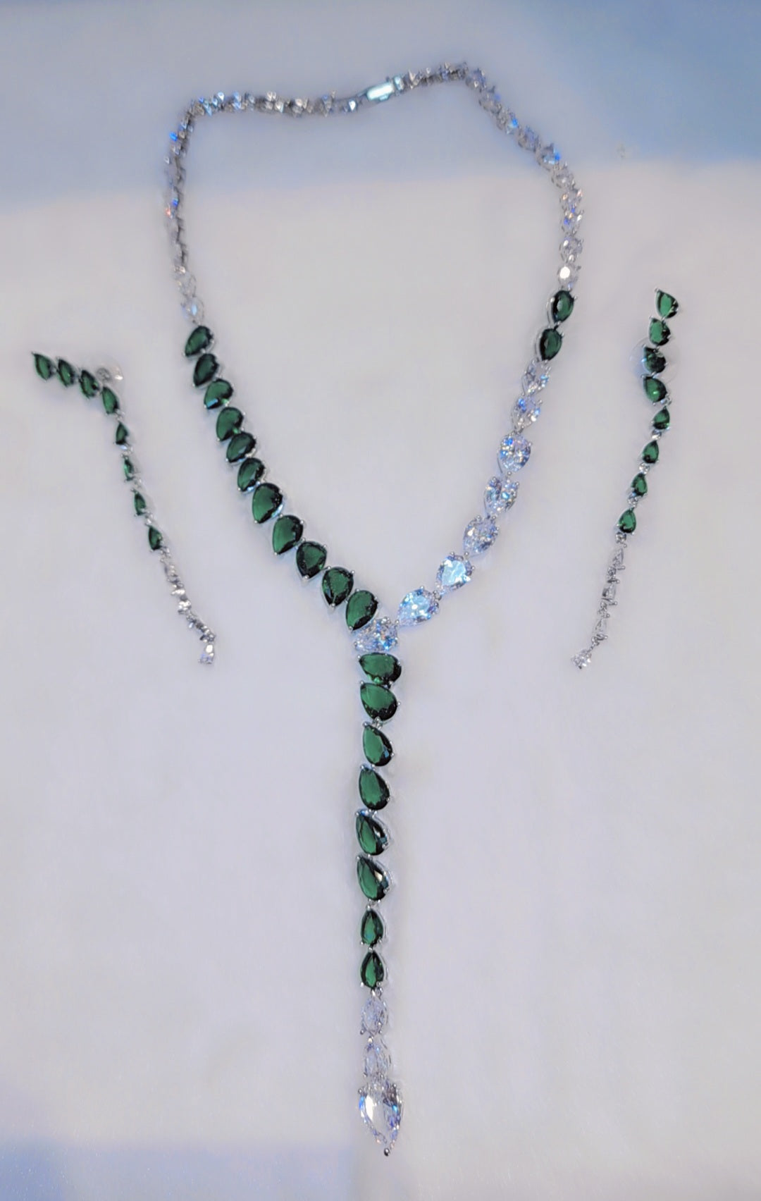 White gold plated dark green set