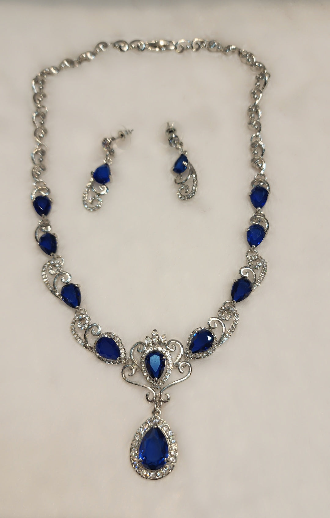 White gold plated dark blue CZ Stone set