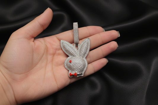 Iced out white gold plated playboy pendant
