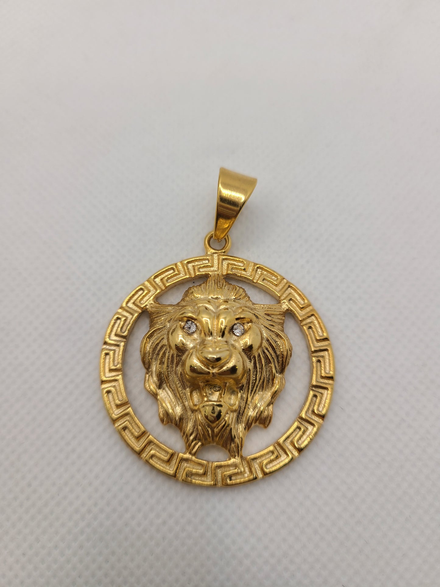 Pendentif lion plaqué or