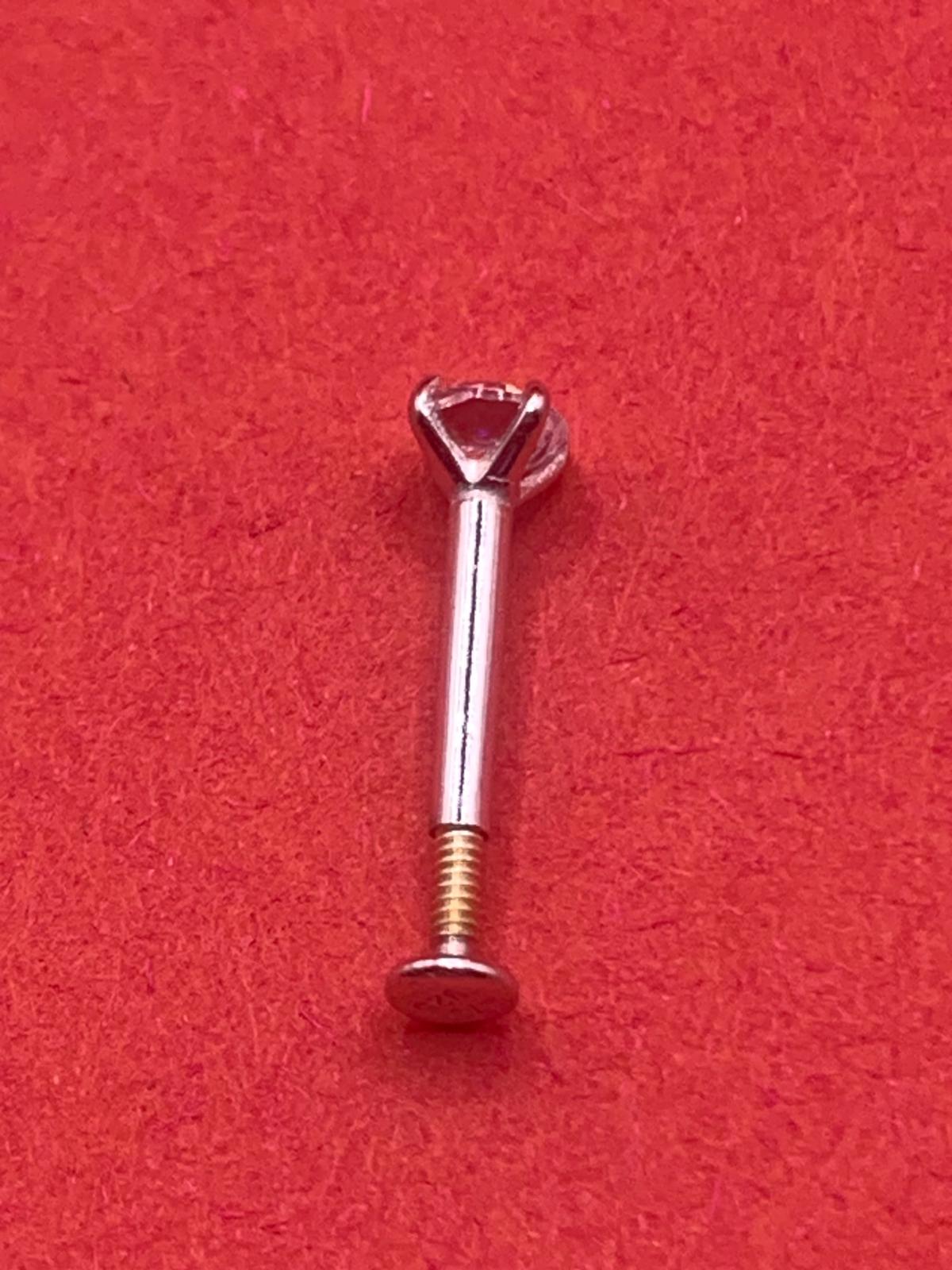 Real silver nose studs with screw back lock.