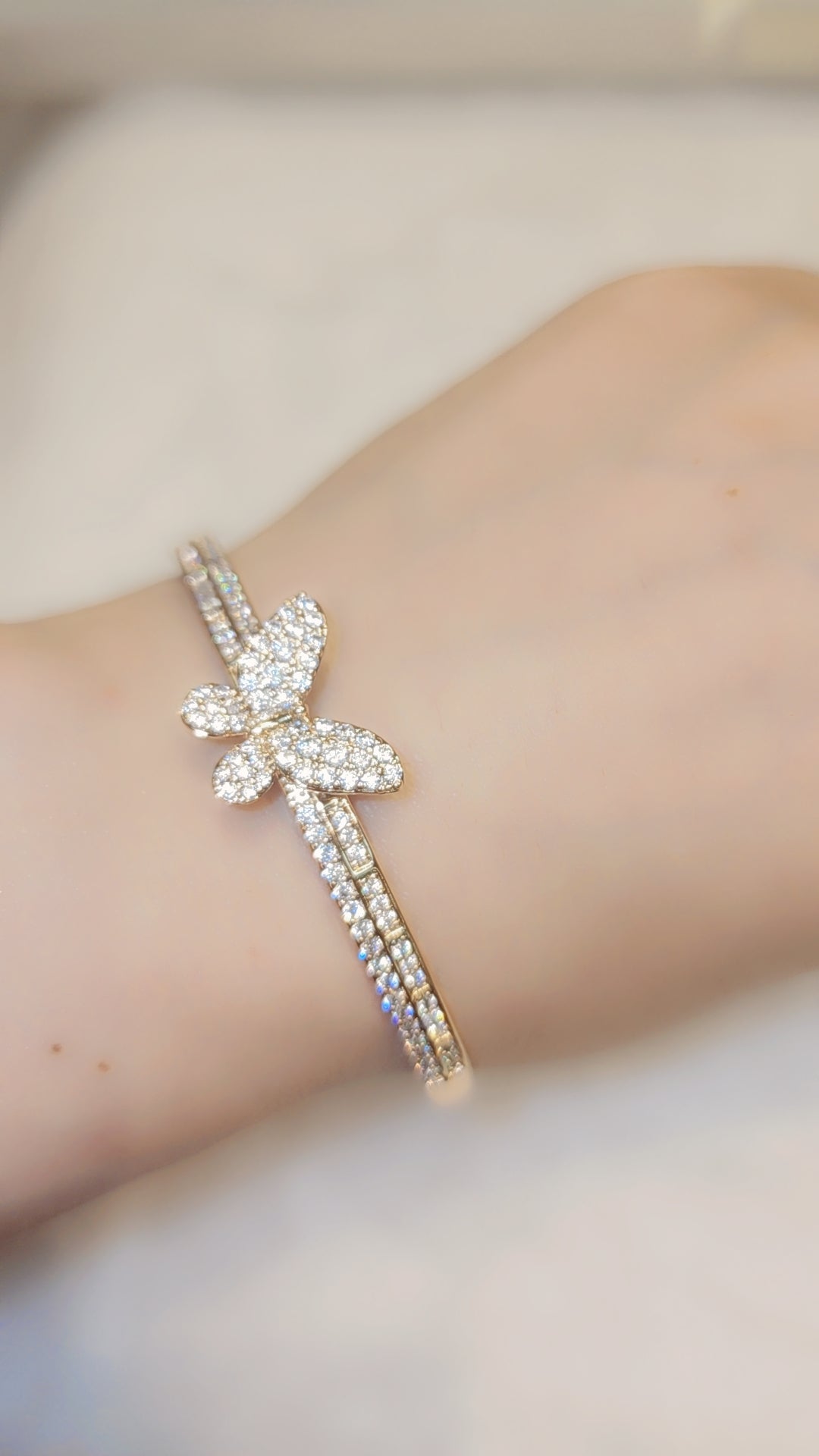 Gold plated butterfly bangle