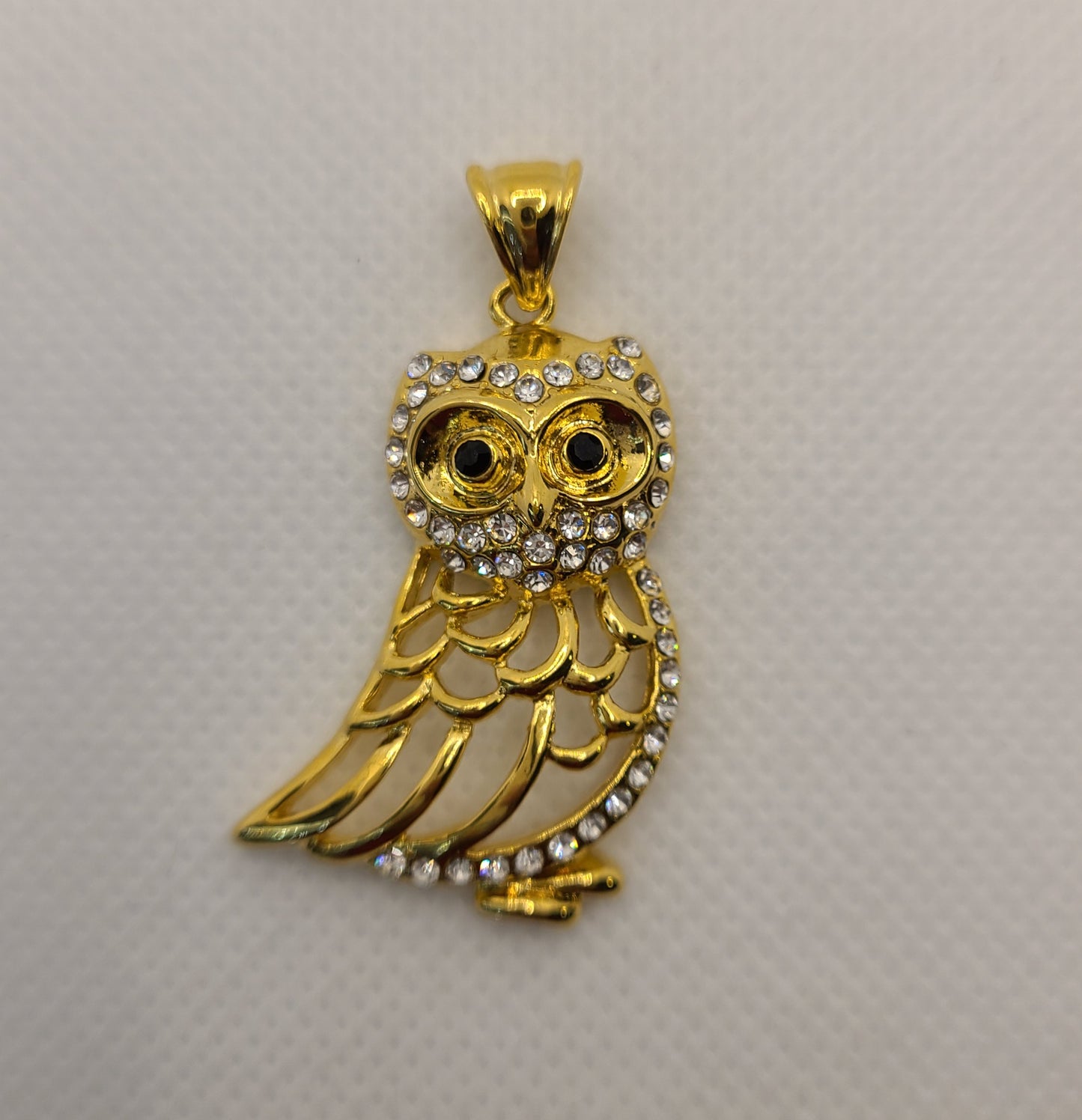 ਸੋਨੇ ਦੀ ਝਾਲ ਵਾਲਾ ਜਾਨਵਰਾਂ ਦਾ ਲਟਕਿਆ ਹੋਇਆ ਪੈਂਡੈਂਟ