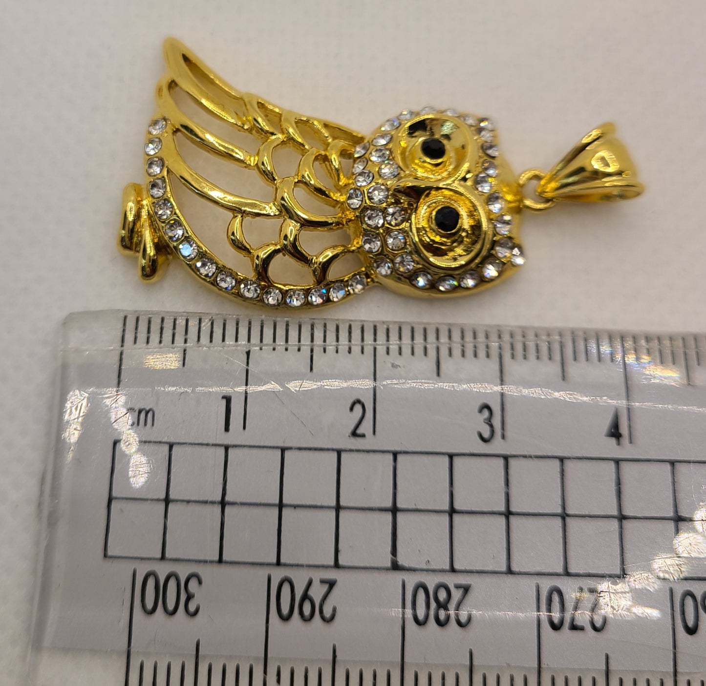 ਸੋਨੇ ਦੀ ਝਾਲ ਵਾਲਾ ਜਾਨਵਰਾਂ ਦਾ ਲਟਕਿਆ ਹੋਇਆ ਪੈਂਡੈਂਟ