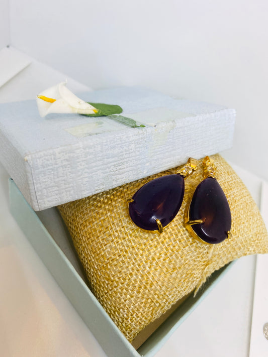 Pendentif en pierre violette