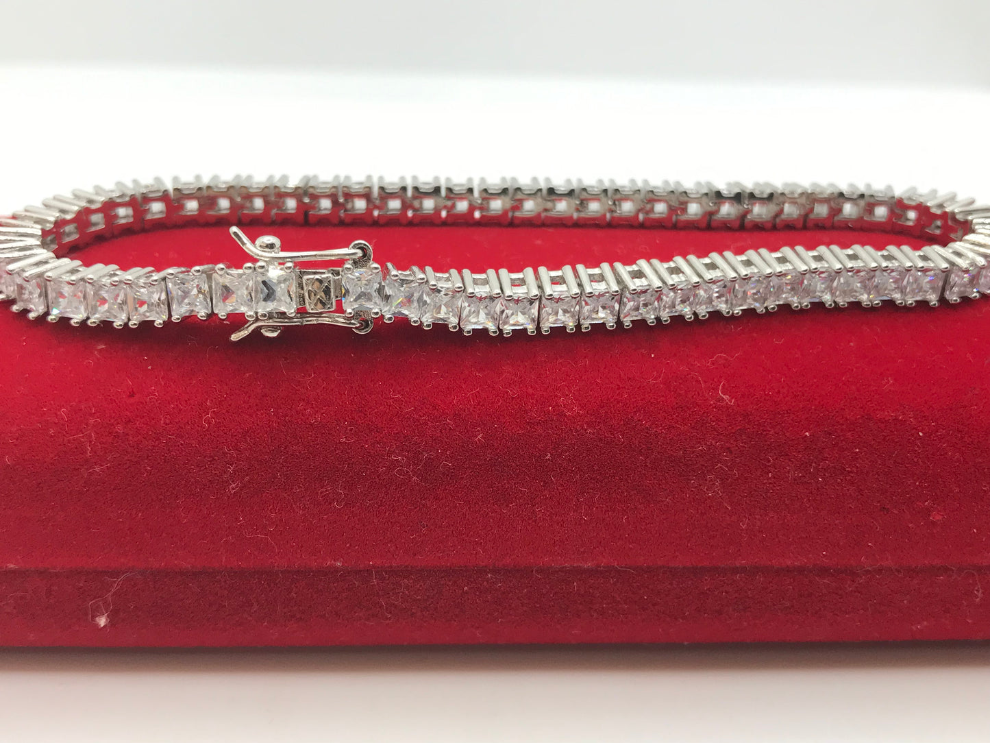 Sterling silver emerald cut tennis bracelet