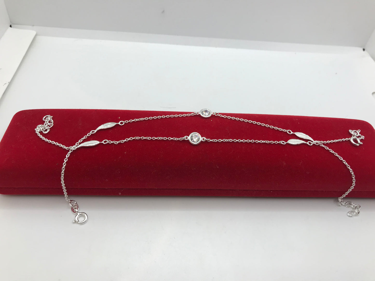 Sterling silver anklet with crystal stone and feathers