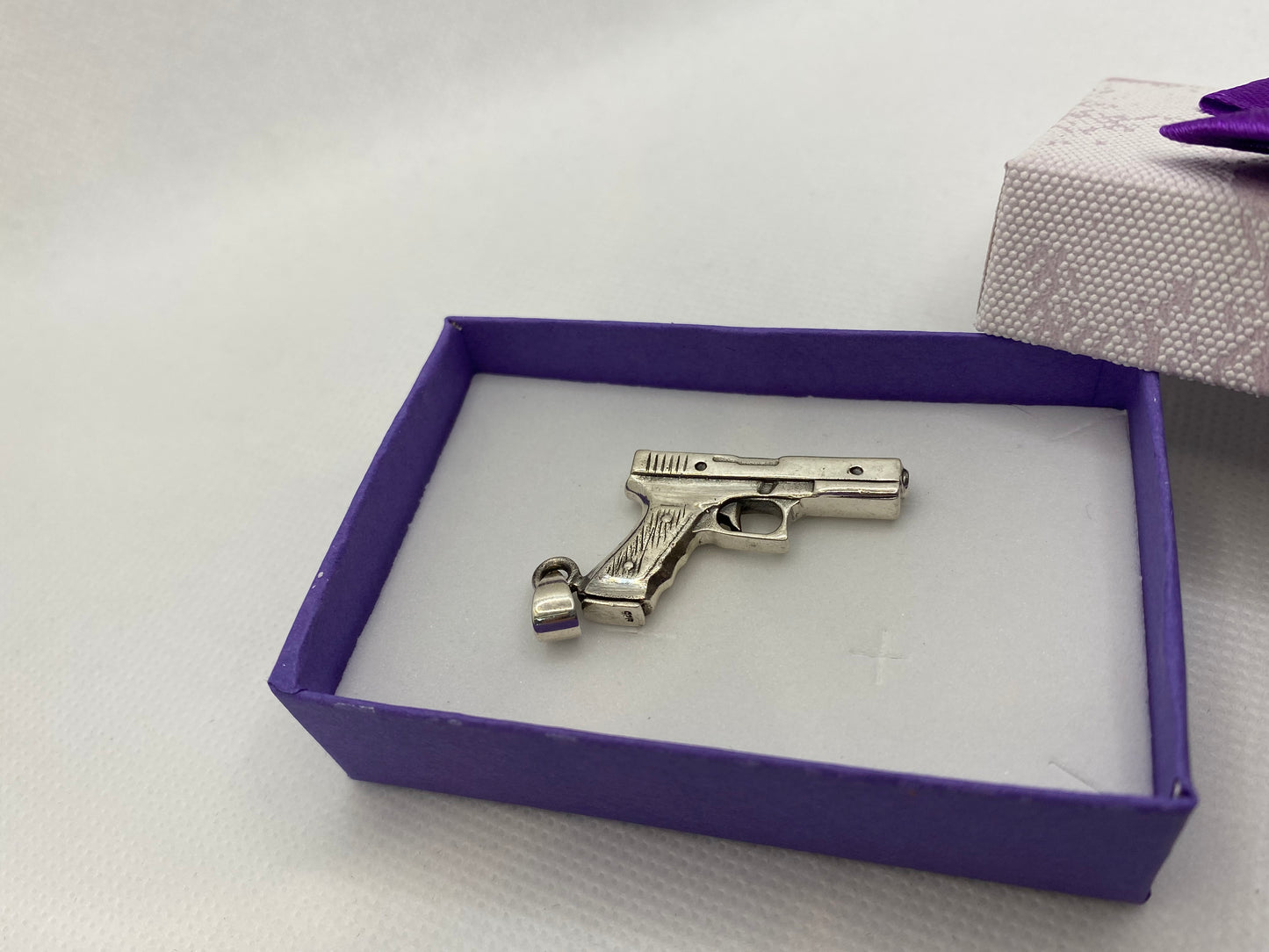 Pendentif pistolet en argent sterling
