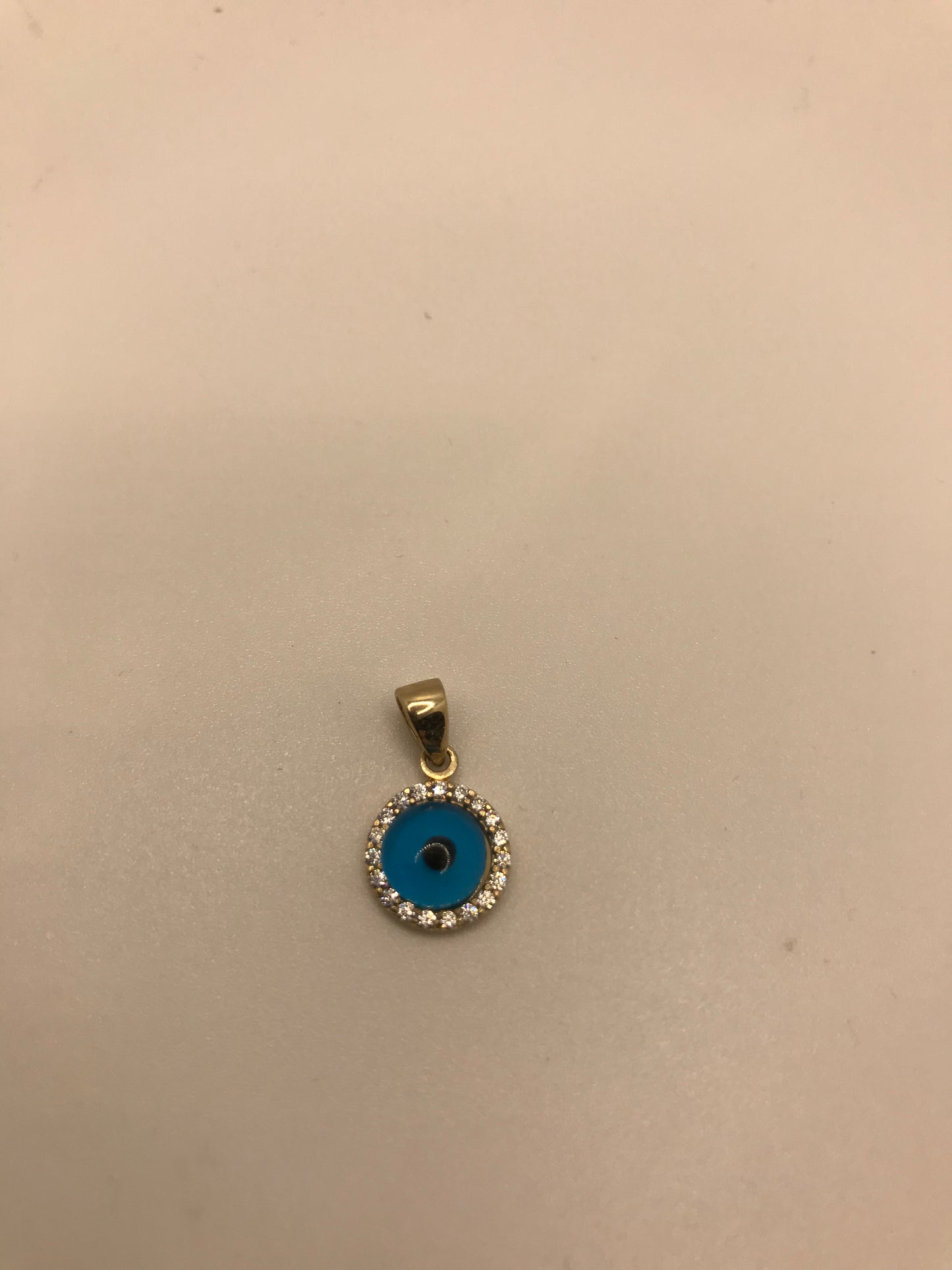 Pendentif mauvais œil en or 10 carats