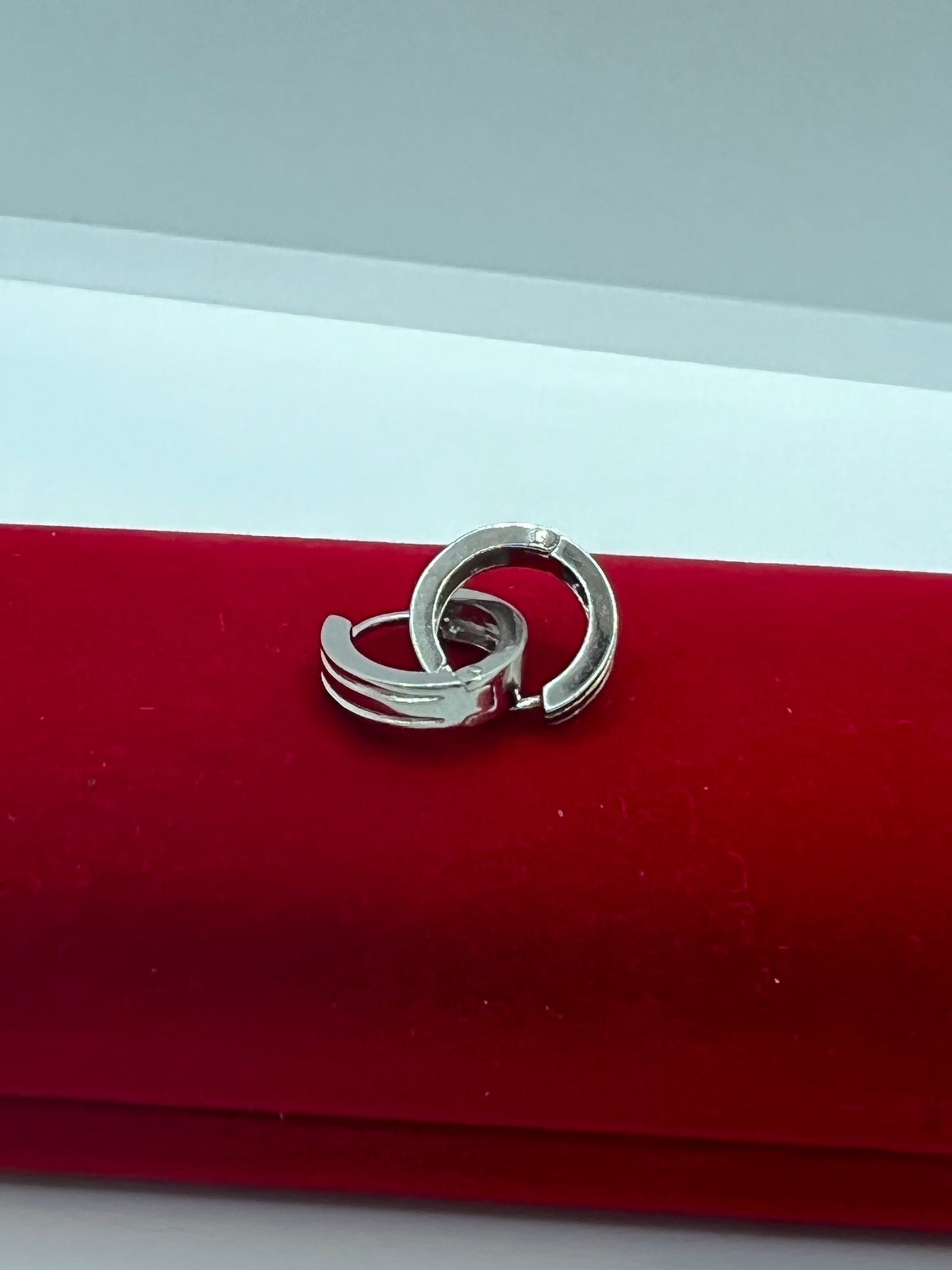 Créoles de créateur en argent véritable