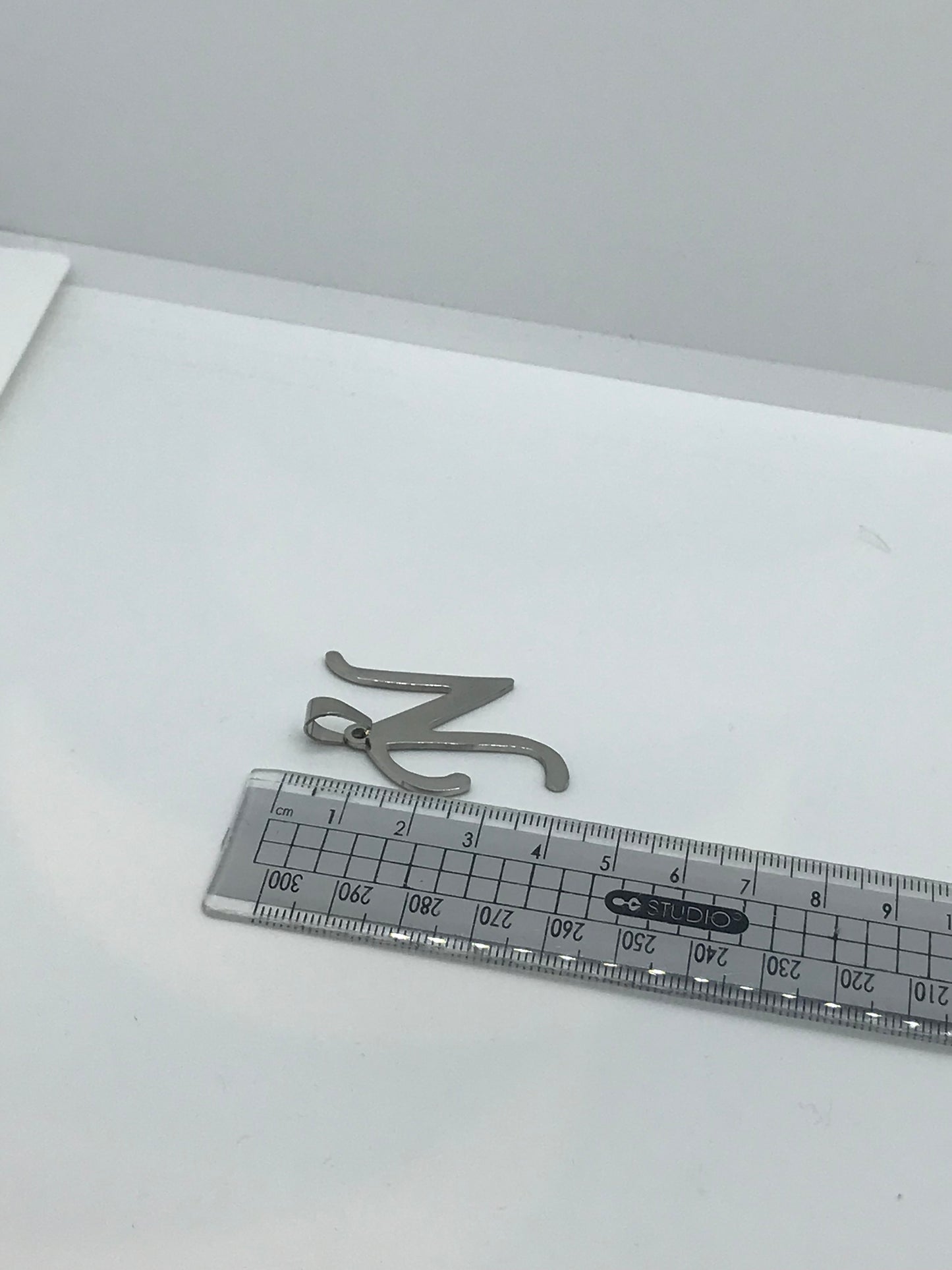 ਸਟੇਨਲੈੱਸ ਸਟੀਲ ਦੇ ਸ਼ੁਰੂਆਤੀ ਪੈਂਡੈਂਟ